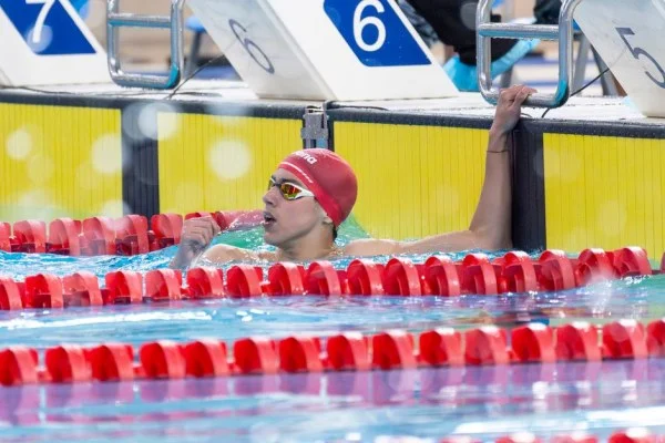 swimmer celebrating victory